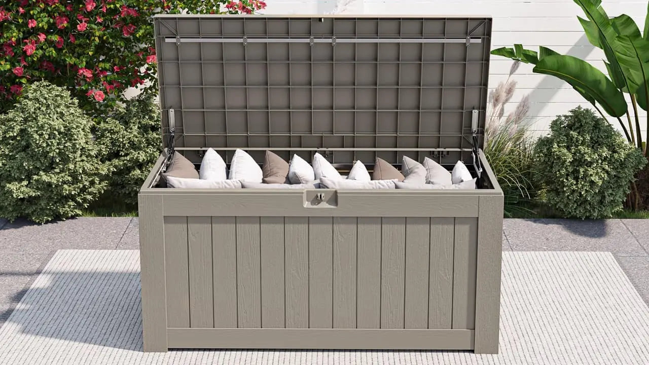 The 120 gallon outdoor storage deck box is filled with patio supplies.