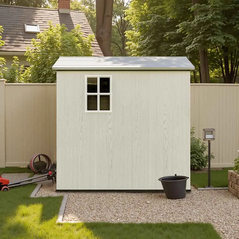 fit-it 4x6 plastic storage shed standing in backyard with door opening color:white