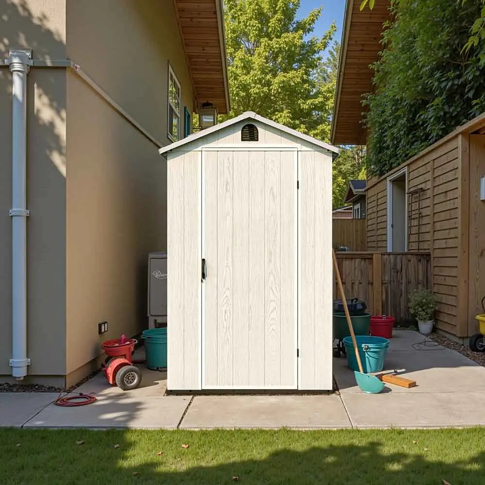 fit-it 4x6 plastic storage shed standing in backyard with door opening color:white